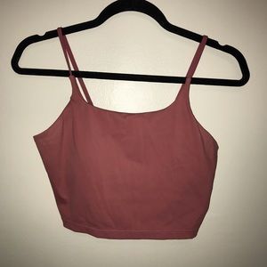 Pink cropped tank sports bra